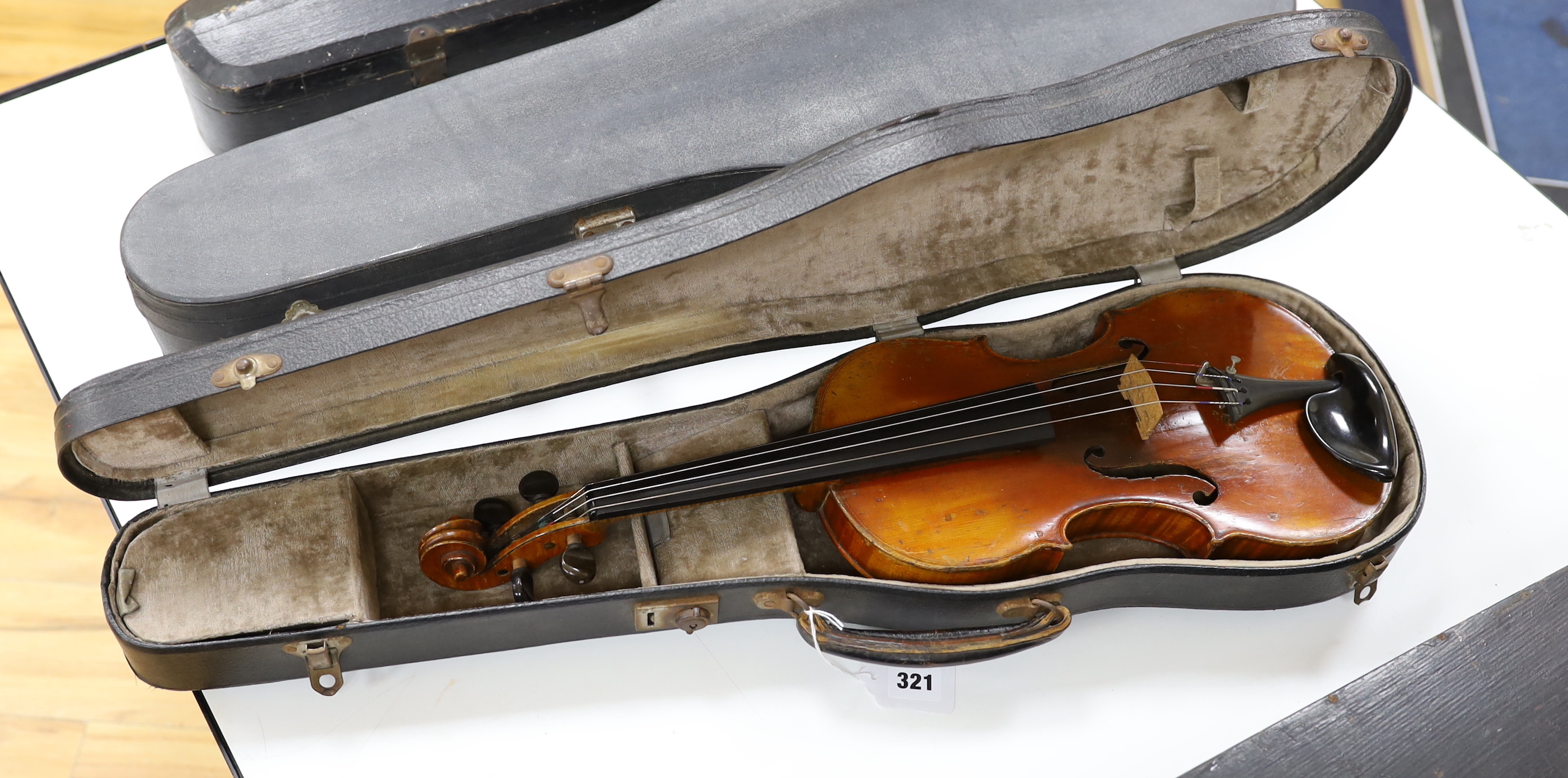 A cased late 19th/early 20th century French violin, bears Joseph Guarnerius label